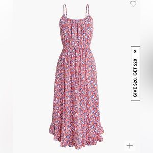 Ruffle midi dress with curved hem